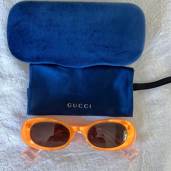 Gucci GG0517S005 orange neon oval sunglasses